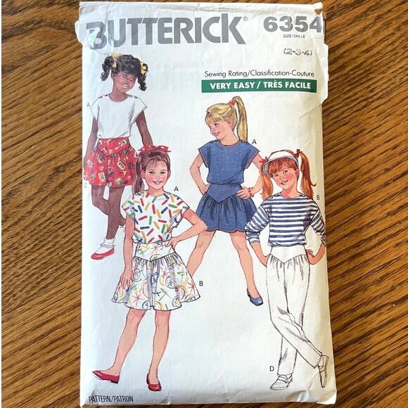UNCUT Vintage 1980s Butterick 6354 Sewing Pattern 2T-4T Top Skirt Culotte Pant - Picture 1 of 2